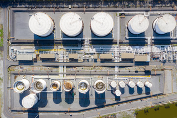 Aerial view of Chemical industry storage tank and tanker truck In wailting in Industrial Plant to tranfer oil to gas station.