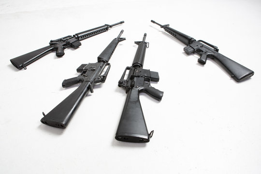 Black rifle machine gun isolated on white background