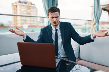 businessman working on his laptop in office