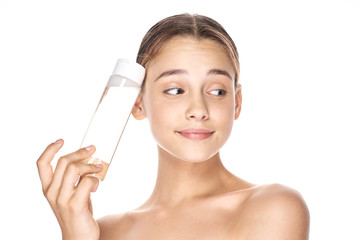 young woman with bottle of water isolated on white