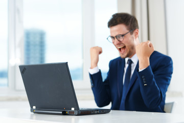 businessman working on laptop in office