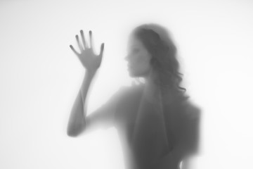 silhouette of woman in hand