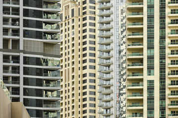 Close-up view of some modern buildings and skyscrapers in Dubai. Dubai is the largest city in the United Arab Emirates (UAE) and the capital of the Emirate of Dubai.