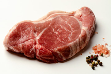 Fresh pork with ingredients for cooking. Steak preperaton Raw Pork