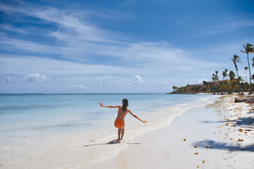 woman walking on the beach