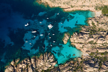 View from above, Stunning aerial view of Cala Coticcio also known as Tahiti with its rocky coasts and small beaches bathed by a turquoise clear water. La Maddalena Archipelago, Sardinia, Italy.