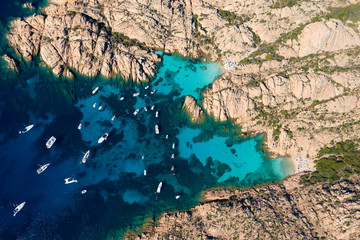 View from above, Stunning aerial view of Cala Coticcio also known as Tahiti with its rocky coasts and small beaches bathed by a turquoise clear water. La Maddalena Archipelago, Sardinia, Italy.