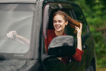 young woman in car