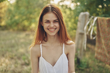 Naklejka premium portrait of young woman in park