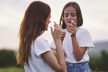 two girls eating ice cream