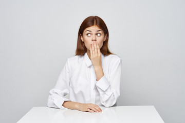 business woman sitting at desk with laptop