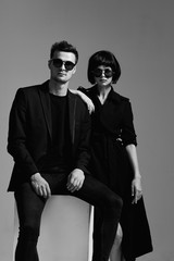 man and woman in masks