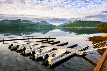 In the morning the boat is rented for fishing and traveling at Sorreisa, Norway.