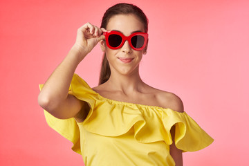 young woman in sunglasses