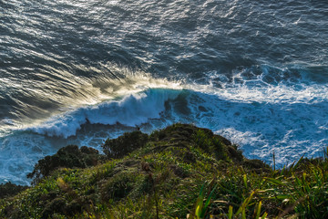 waves crashing on rocks