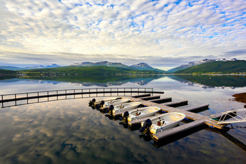 In the morning the boat is rented for fishing and traveling at Sorreisa, Norway.