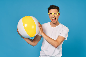 young man with tennis ball