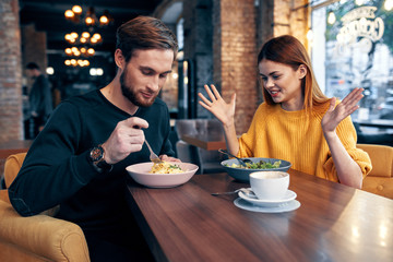 young couple having dinner in a restaurant