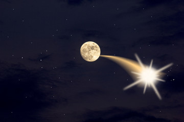 Fototapeta premium .The moon has stars all around and the light rushes in.