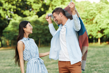 Fototapeta premium young couple having fun in park