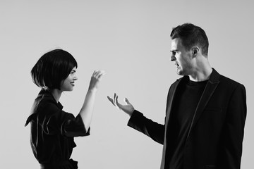 boy and girl with bottle of wine