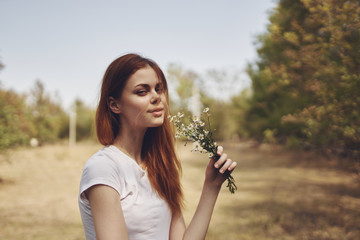 portrait of young woman in park