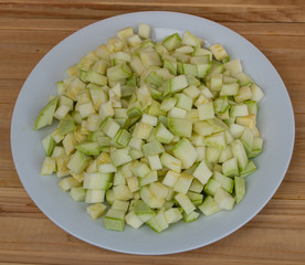 Sliced zucchini in small pieces. Cooking process
