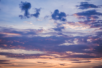 Romantic sunset sky with fluffy clouds and beautiful heavy weather landscape for use as background images