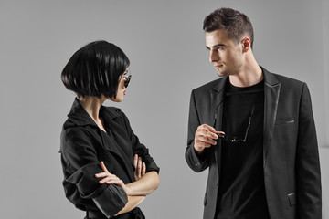 man and woman fighting over white background