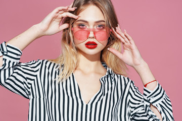 portrait of young woman in glasses