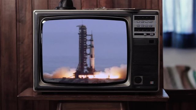  Apollo 11 Rocket Launch in a Vintage TV. Elements of this image furnished by NASA.  