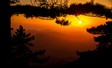 UNESCO World Heritage Site Natural beautiful landscape silhouette sunset Huangshan mountain scenery ( Yellow mountain ) in Anhui CHINA, It is a best of China major tourist destination.