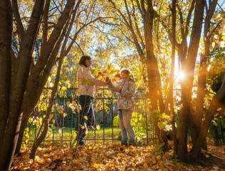 Fototapeta premium Happy family on an autumn walk.