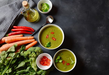 Healthy Vegan Creamy blended vegetable Soup puree with broccoli, celery, peas and carrots . Green...