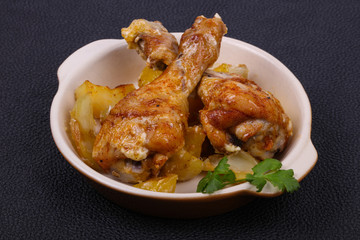 Roasted chicken legs with potato