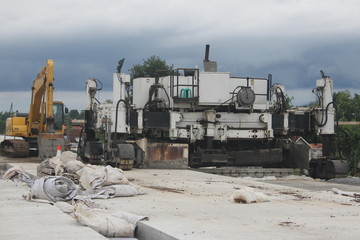 construction machinery is working on road projects and building structures
