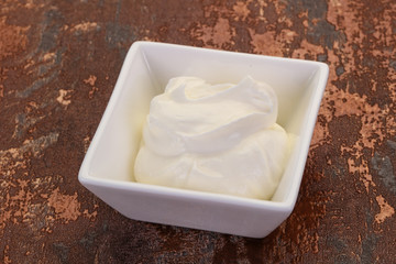 Sour cream in the bowl