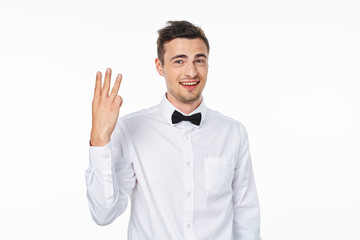 portrait of a young man showing thumbs up sign