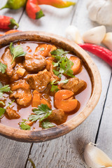 Beef goulash served in bowl