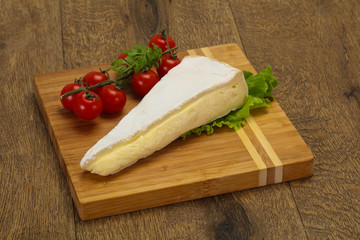 Brie cheese triangle served salad
