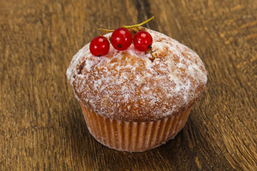 Sweet tasty muffin with red currants