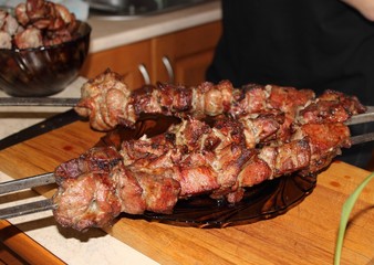 Homemade food on the fire, festive treats, grilled meat, barbecue,shampura, pork, gourmets, delicious pieces