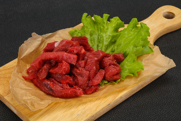 Raw beef meat sliced for cooking