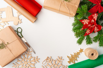 Accessories for Christmas gifts decorating on white background, top view, copy space