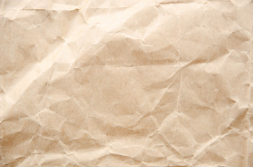 Flat lay craft paper texture. Crumpled cream paper background