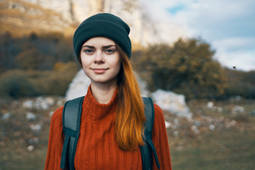 portrait of young woman in autumn park