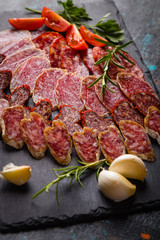 Cured pork and beef sausages