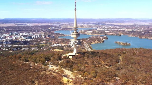 Aerial view of Telstra Tower in Canberra, the capital of Australia showing a beautiful panoramic view of the city and Lake Burley Griffin      