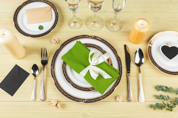 Top view of a wedding table setting with decorations