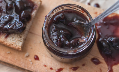 Bread with homemade cherry jam. Healthy food